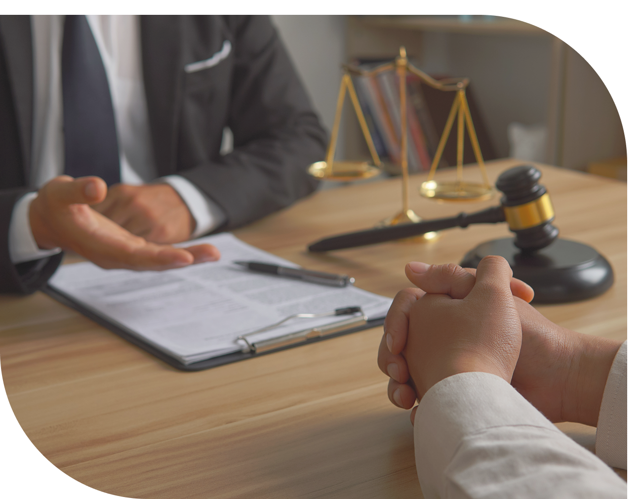 Legal consultation with gavel and scales.