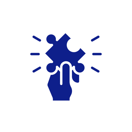 Hand holding puzzle piece with rays.